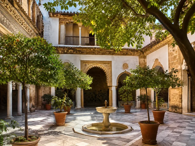 The Patio Morisco (Moorish courtyard) with its arches and tilework